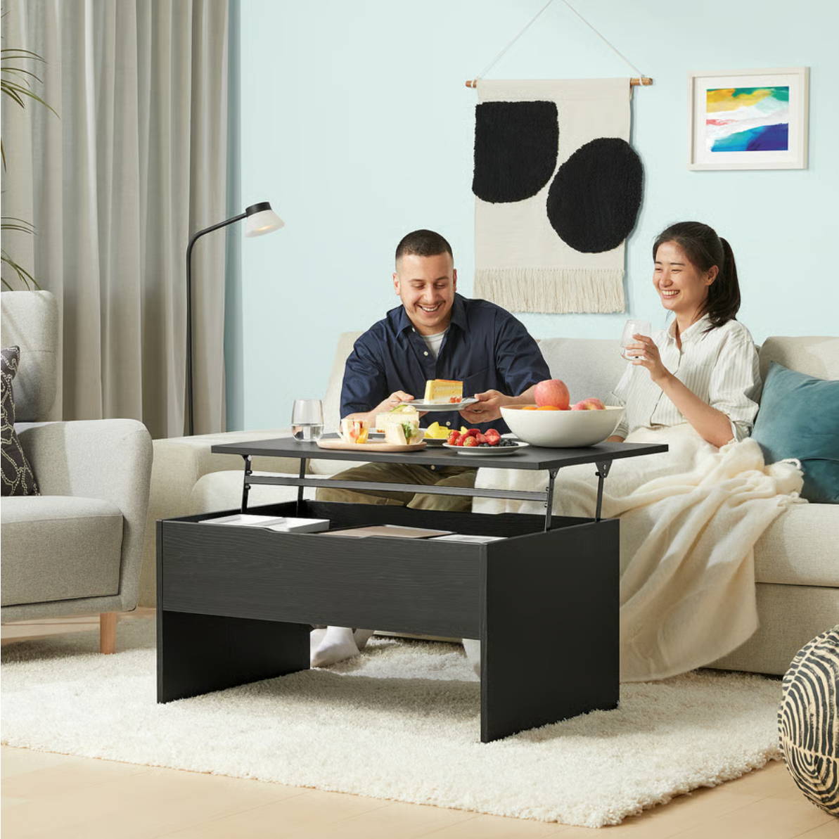 OSTAVALL Adjustable coffee table, black, 90 cm