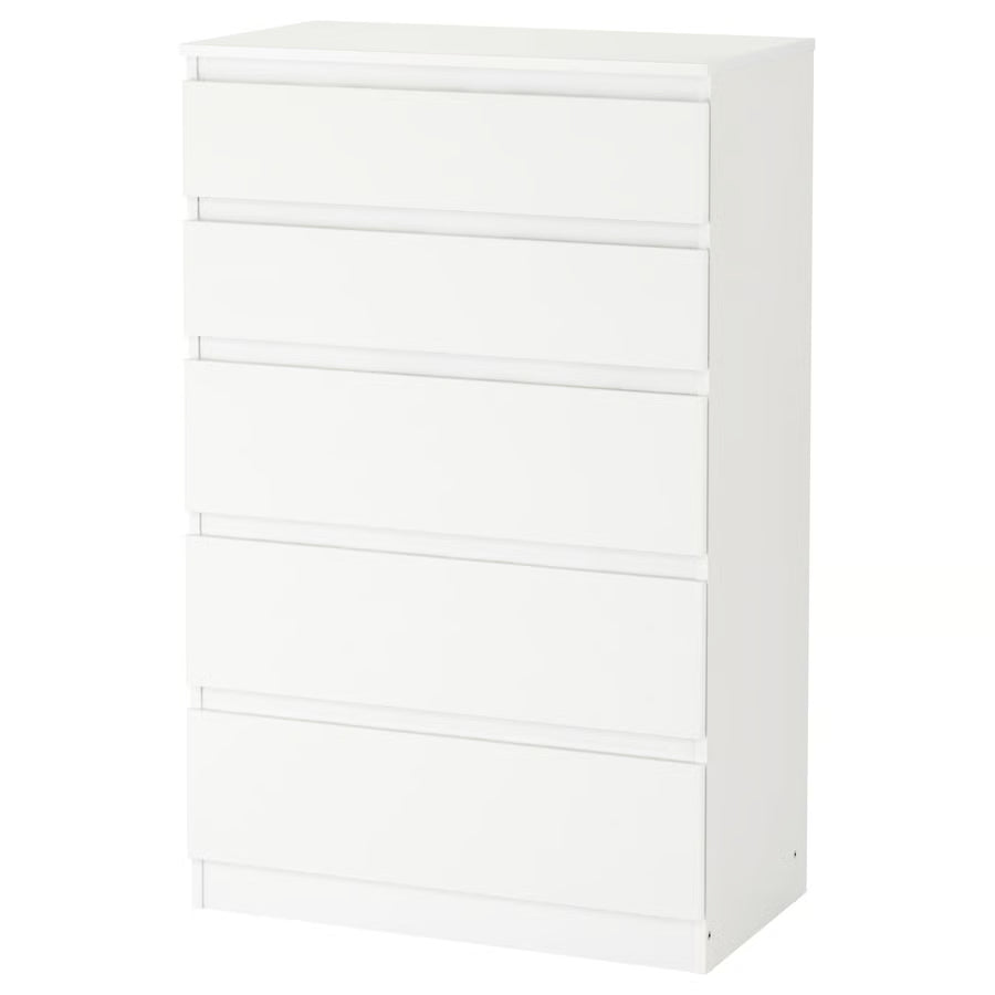 White dresser with multiple drawers on a white background